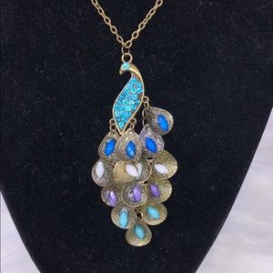 Beautiful antique gold tone peacock necklace.
